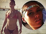'My Bond Girl' says Swizz Beatz as he uploads a sultry picture of his wife Alicia Keys standing in her bikini on Twitter