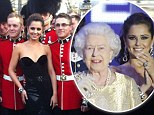 Queen�s Diamond Jubilee 2012 concert: Mixing with The Royal crowd! Cheryl Cole poses up with men in uniform before standing up on stage next to Her Majesty