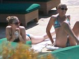 Time to catch some rays: Scarlettt took off her dress once lying down to get a little tan on her back