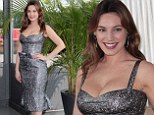 Silver siren: Kelly Brook sparkles and accentuates her curves in a metallic grey dress as she attends Italian film festival